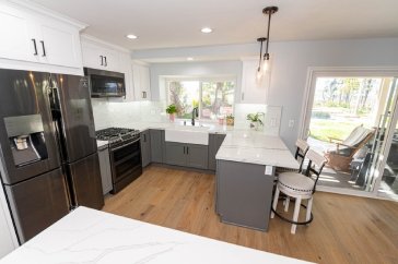 Kitchen with gray and white color scheme